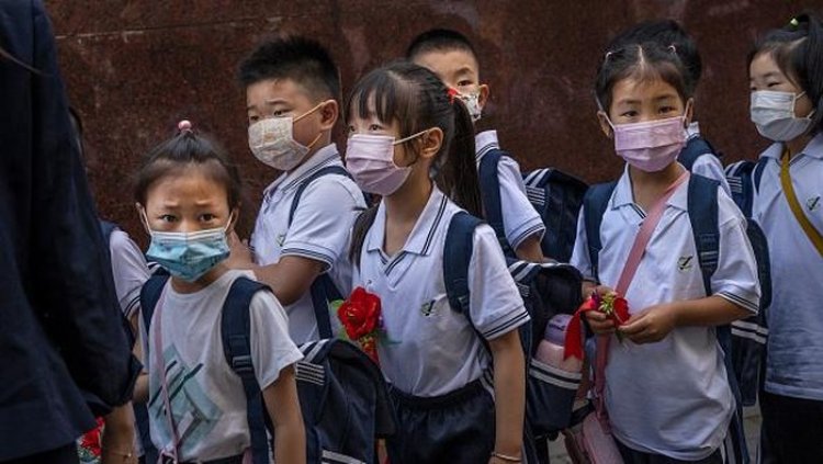 China Mencabut Aturan Wajib Masker di Lingkungan Sekolah dan Kampus